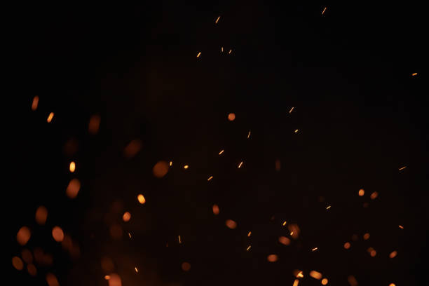 istock sparks from bonfire over dark night environment 1486764095