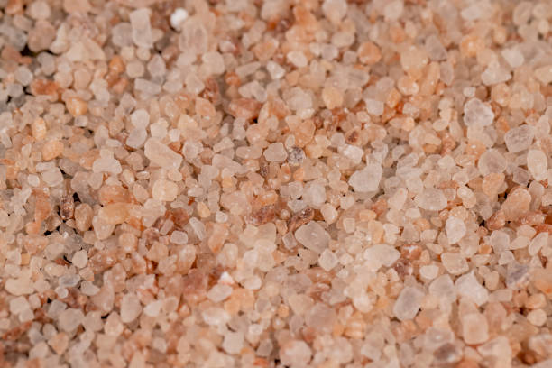 istock Pink natural salt on the table, close up 1486764456