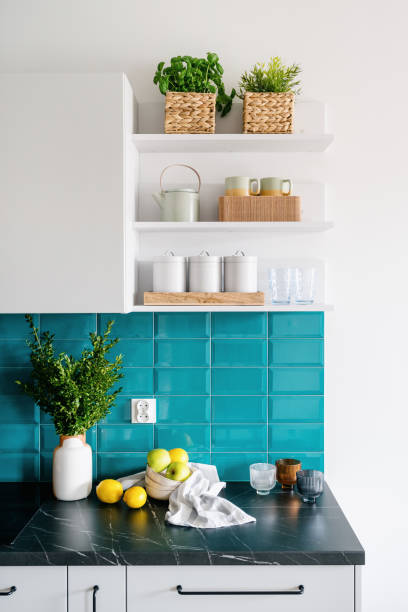 istock fresh fruits, kitchenware and food containers on shelf in cozy kitchen 1486766034