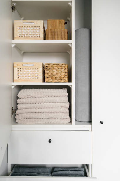 istock wood boxes with laundry in modern wardrobe, storage concept 1486766443