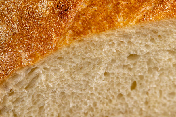 istock A cut loaf of round-shaped wheat bread 1486766758