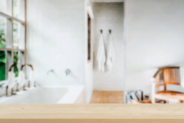 istock Empty wooden shelf against blurred bathroom interior 1486767033
