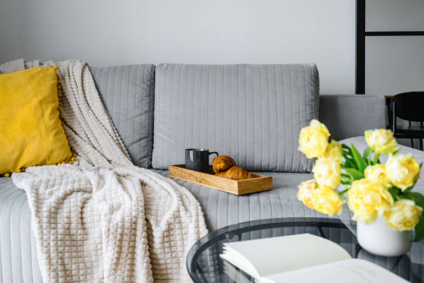 istock lounge room with stylish design, breakfast and cup of drink on sofa 1486767112