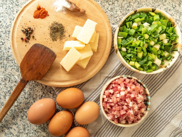 istock ingredients for preparing omelet with bacon cheese and fresh vegetables 1486770964