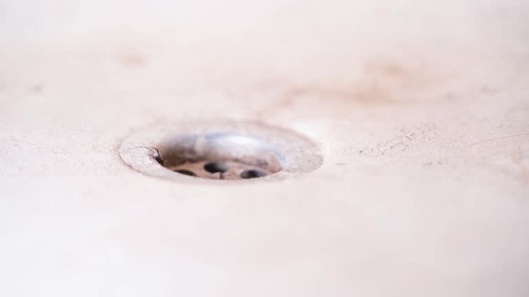 Bathroom with dirty drain hole, close up