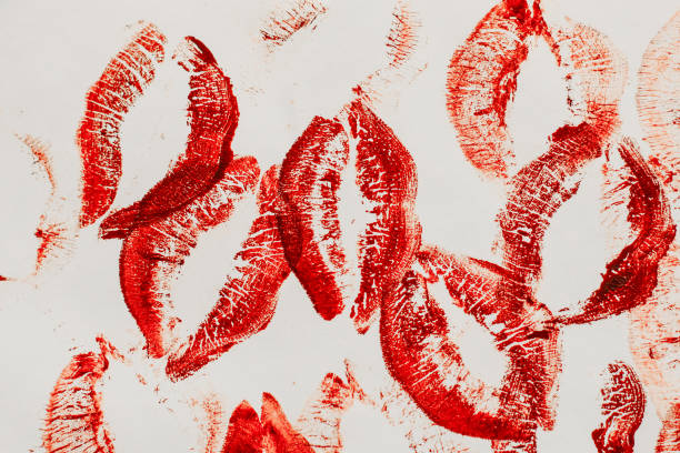 istock Lip prints of cosmetic lipstick on a light background 1486783124