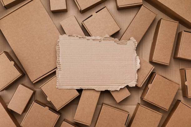 istock Heap of cardboard boxes from craft paper top view. Eco delivery, zero waste, plastic free package. 1486783209