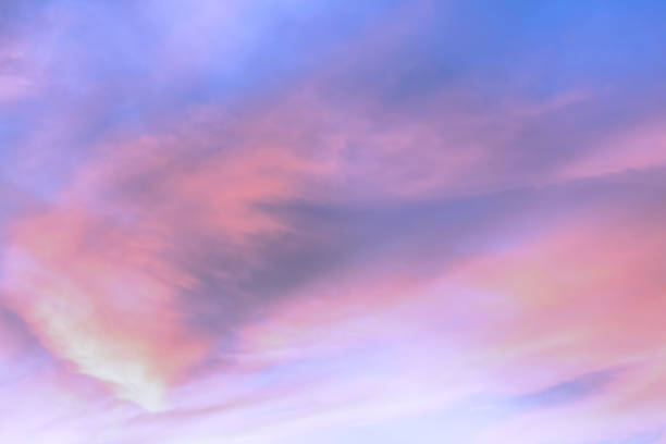 istock Sky with soft and fluffy pastel orange pink and blue colored clouds. Sunset background. Nature. sunrise. 1486785360