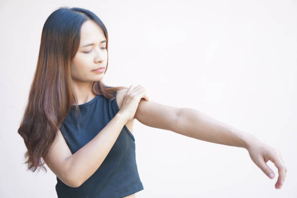 istock Asian woman having shoulder pain. 1486788926