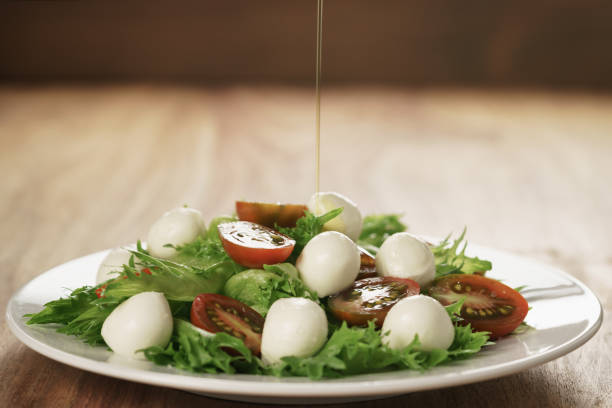 istock salad with kumato tomato, mozzarella and frillies lettuce 1486791157