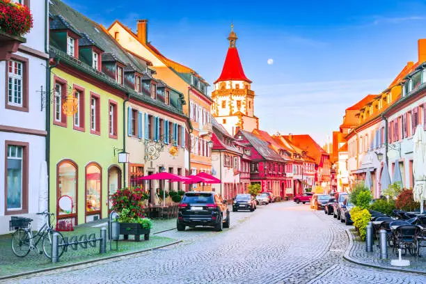 Gengenbach, Germany. Picturesque sunrise charming city in the Black Forest region, known for its timber-framed historic and cobblestone streets. Niggelturm gate of the walled downtown.