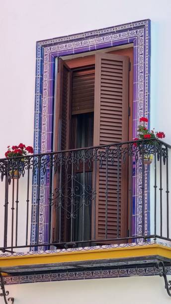 istock Balcony with a decorative door frame in Seville. 1486796087