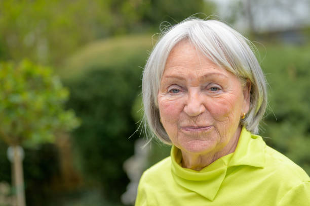 istock Elderly lady in her early 80s with white-grey hair 1486799497