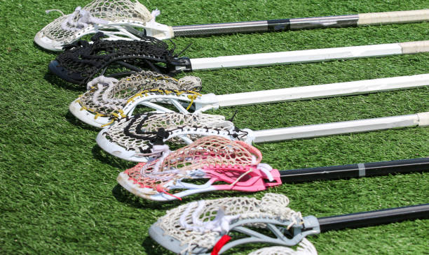 istock Six lacrosse sticks on the ground 1486803022