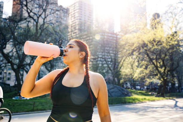 istock Woman jogging in Central Park 1486805198