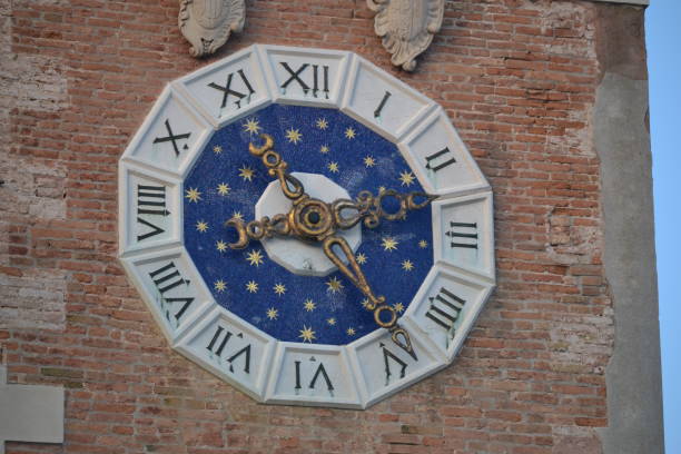 istock Clock in Venice with Roman numerals on a tower 1486811287