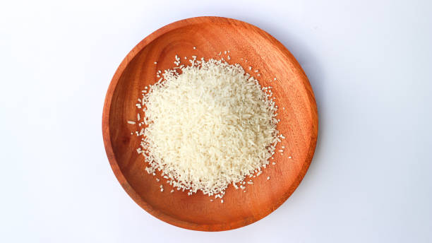 istock White rice on wooden plates 1486817611