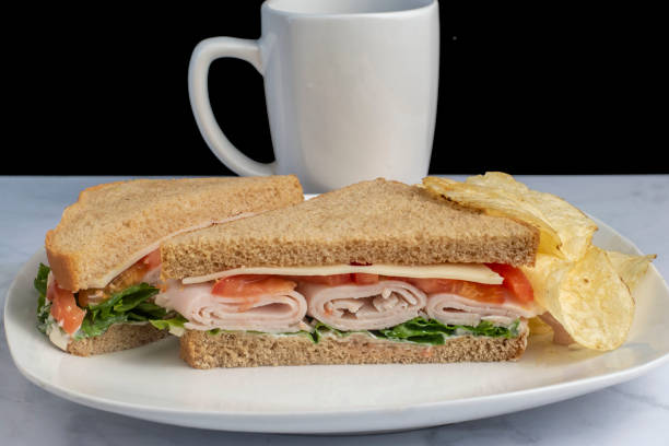 istock turkey  sandwich  with   a side of potato chips 1486817630