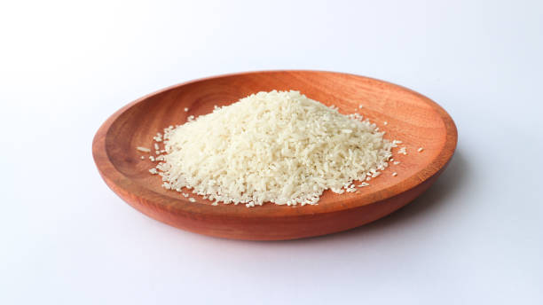 istock White rice on wooden plates 1486817692
