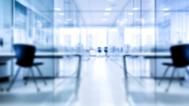 istock Abstract blurred motion office background, blurry working space with defocused effect, business concept 1486818081