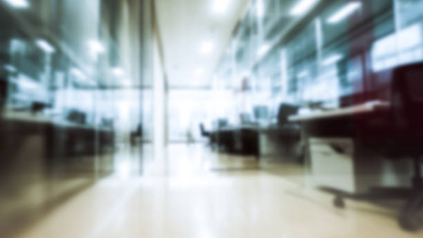 Abstract blurred motion office background, blurry working space with defocused effect, business concept