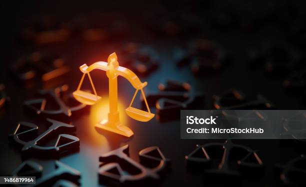 Orange Scale Symbol Glowing Amid Black Scale Symbols On Black Background Stock Photo - Download Image Now