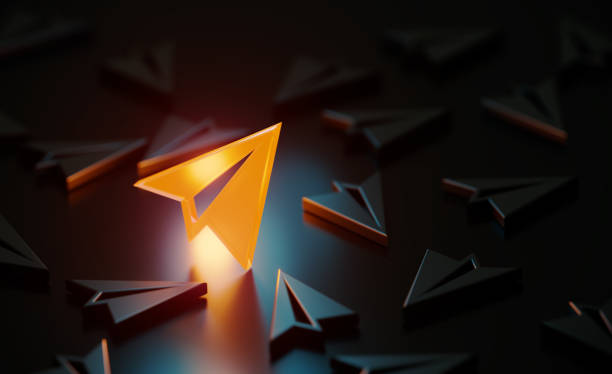 istock Orange Plane Symbol Glowing Amid Black Lightbulb Symbols On Black Background 1486820262
