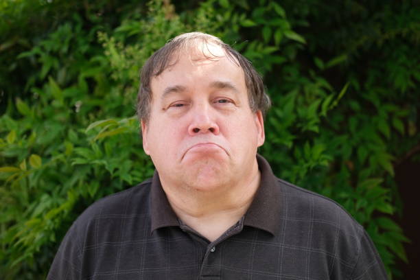 istock Autistic adult making different facial expressions 1486822459