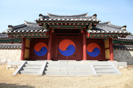 Old Korean traditional house door with Taegeuk symbol