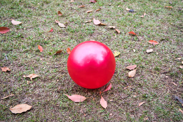 istock A park square and a cute red ball 1486827726