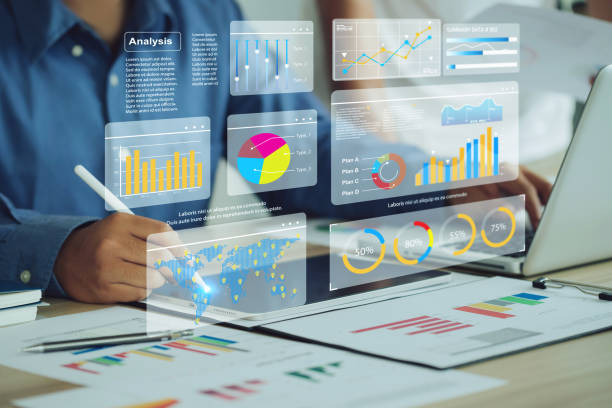 istock Two analyst works on a laptop showing data business analysis and Data Management System with KPI and metrics connected to the database for technology finance operations Data Analytics Statistics. 1486828854