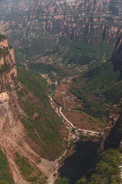 istock The village and road in the valley 1486830363