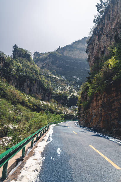 istock The road on mountain after snow 1486831449