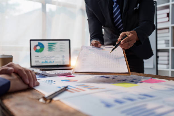 istock Business team discuss and research and making project strategy, finance, analysis, teamwork, plan, meeting concept 1486832416