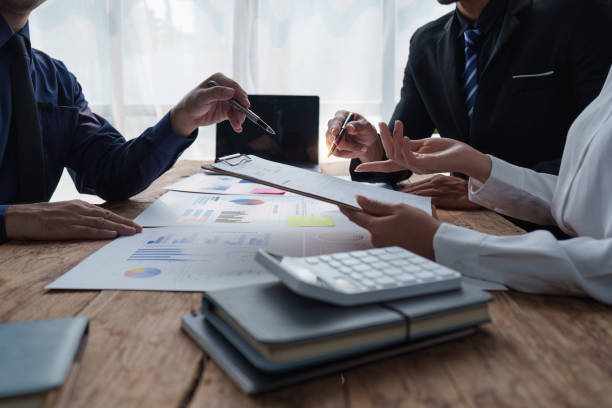 istock Fund managers team consultation and discuss about analysis Investment stock market. analysis, research finance 1486832905