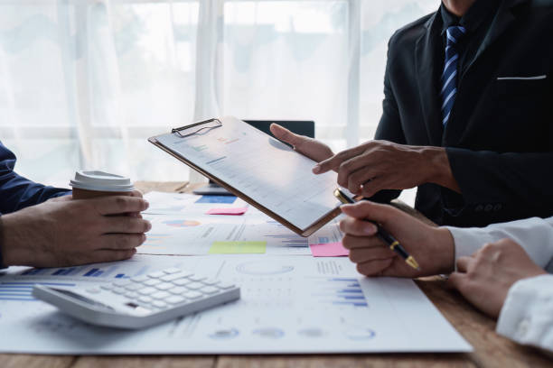 istock Business team discuss and research and making project strategy, finance, analysis, teamwork, plan, meeting concept 1486833607