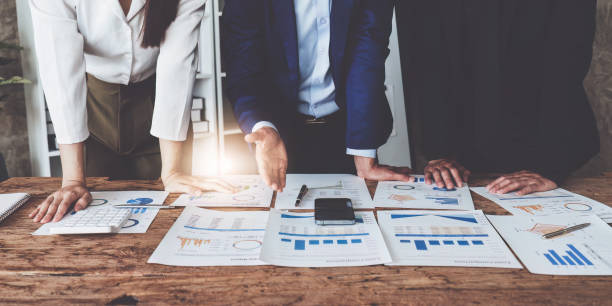 istock Business team discuss and research and making project strategy, finance, analysis, teamwork, plan, meeting concept 1486834437