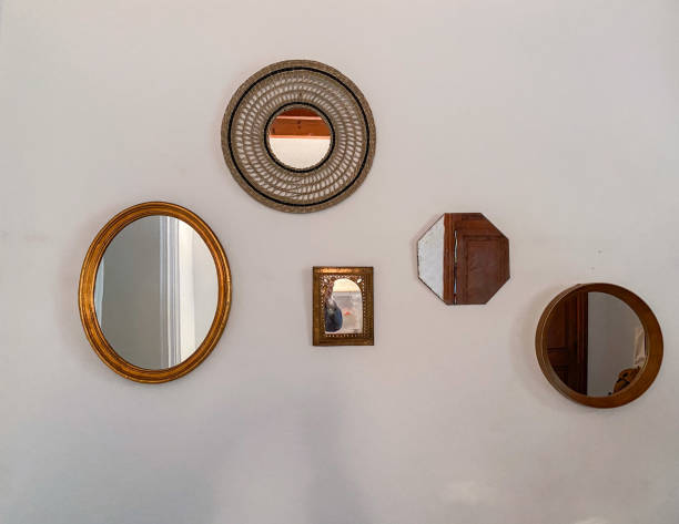 istock Mirrors placed randomly on the wall of the house 1486837524
