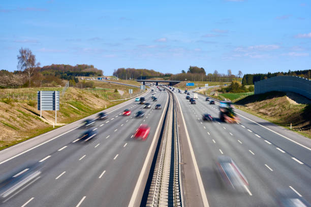 istock Heavy traffic on multiple lane highway 1486838380