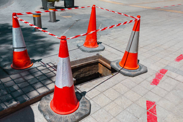 istock Street sinkhole repair 1486843410
