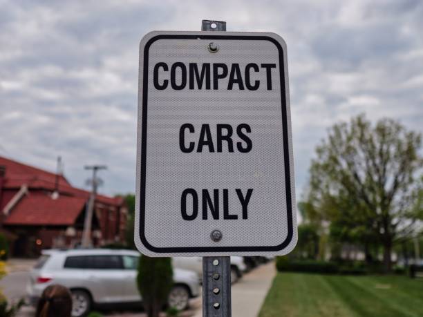 istock Compact Cars Only Sign on Cloudy Day 1486843467