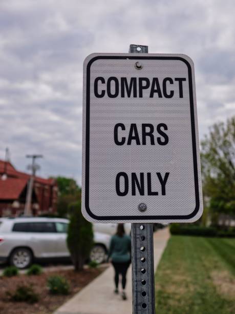 istock Compact Cars Only Sign on Cloudy Day 1486843468