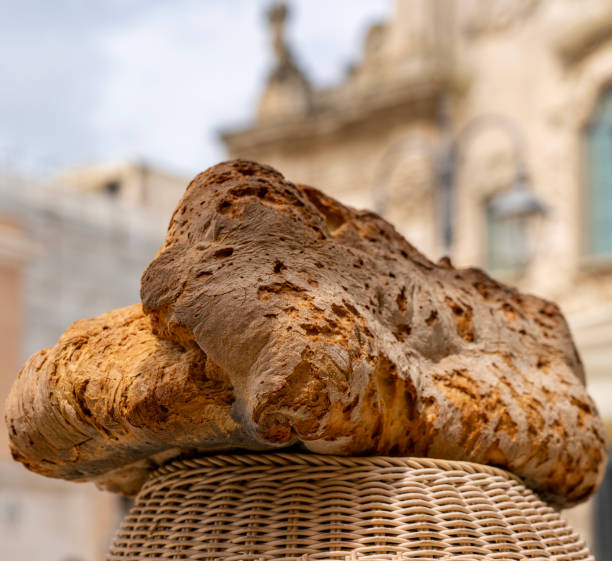 The traditional Pane di Altamura is a type of Italian naturally leavened bread made from durum wheat semola from the Altamura area (Bari), in the Apulia region, south of Italy stock photo