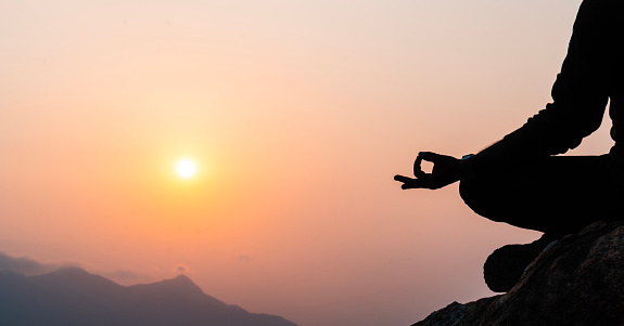 Silhouette Woman practice yoga tree pose to meditation with summer vacation beach happiness and relaxation. Calm female exercise with yoga meditate ocean beach with sunset golden time. Mental health.