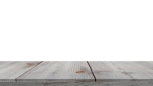 istock Wood table front view with blank white background for product display. 1486847371