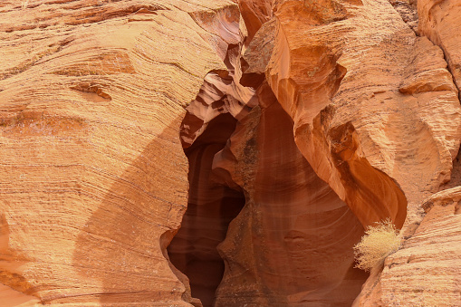 The desert sandstone opens into the slots in the Upper Antelope Canyon in Page Arizona a part of the Navajo Parks and Recreation.