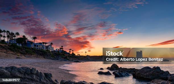 Sunrise In Playa De Casares Malaga Andalusia Stock Photo - Download Image Now - Casares, Cloud - Sky, Coastline