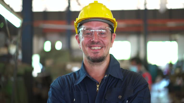 Factory engineer posing portrait for photography in factory.