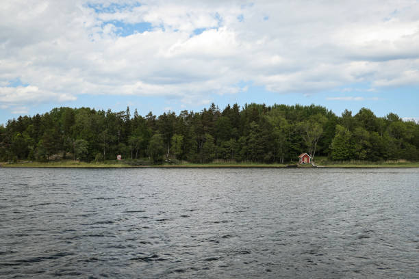istock Scenic view of lake against cloudy sky 1486857970