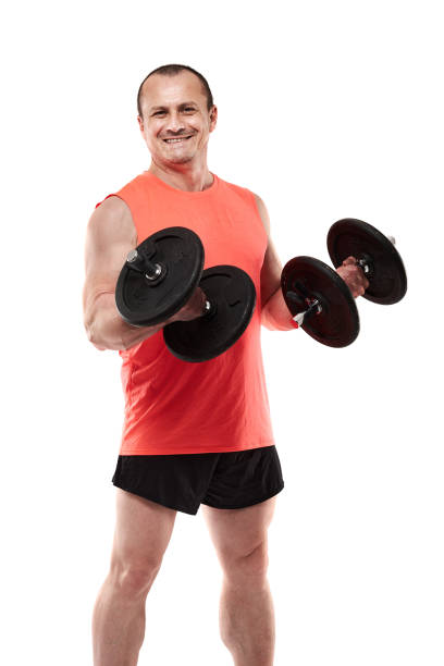istock Mature man doing fitness workout with dumbbells 1486863930